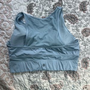 Athleta womens halter sports bra- light blue size medium. Mesh back panel